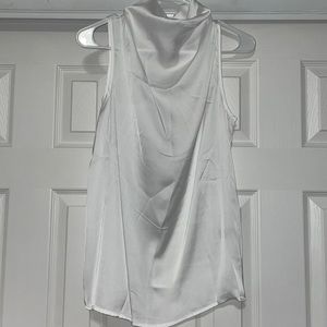 Never worn. I don’t like silky clothing but still super cute